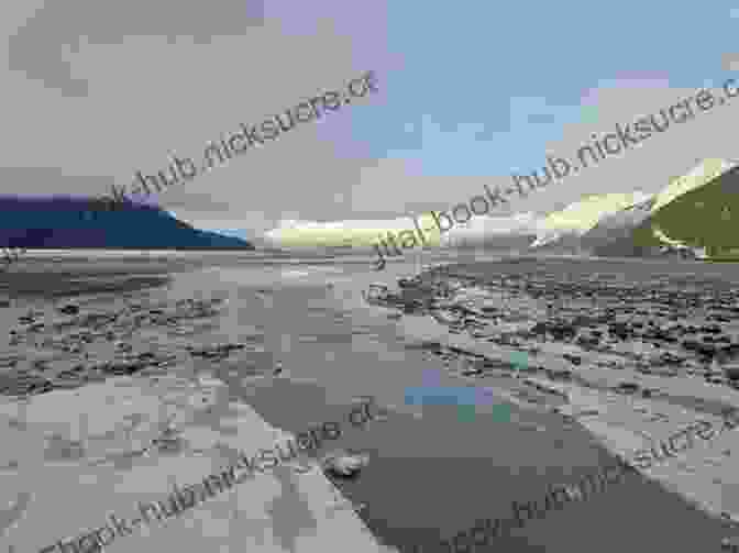 A Fishing Boat Sails Through The Waters Of Cook Inlet, With The Rugged Peaks Of The Kenai Mountains In The Distance Mudflats Fish Camps: 800 Miles Around Alaska S Cook Inlet