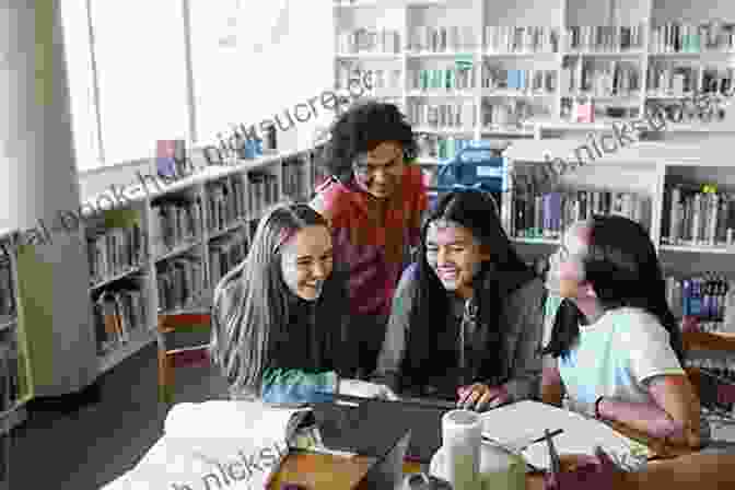 A Group Of Immigrant Students Studying Together In The Library At Fargo High School, Surrounded By Books And Computers. Green Card Youth Voices: Immigration Stories From A Fargo High School