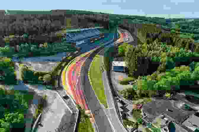 A View Of The Circuit De Spa Francorchamps Track Winding Through The Lush Green Landscape Running With The Horses: A Memoir Of Travel Racetracks Foods